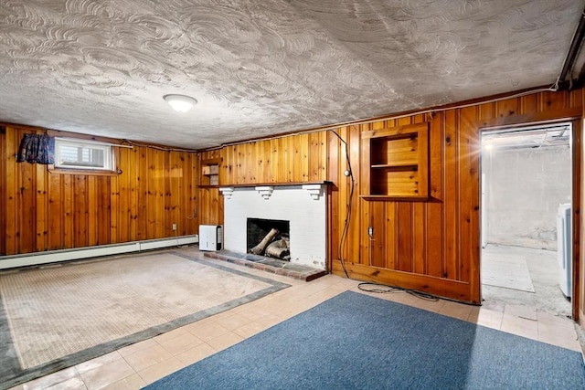80 Joyce Kilmer Rd, Boston, MA 02132 - basement with a baseboard heating unit, wooden walls, tile patterned floors, and a brick fireplace