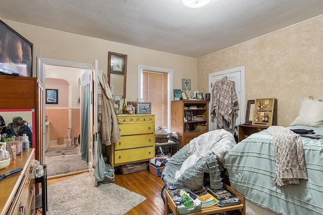 bedroom with light hardwood / wood-style flooring