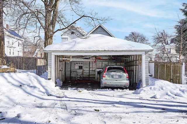 view of snow covered garage