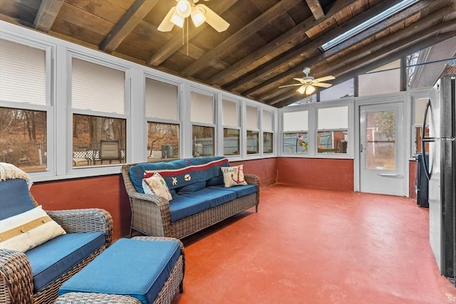 sunroom / solarium with lofted ceiling with beams, wooden ceiling, and ceiling fan