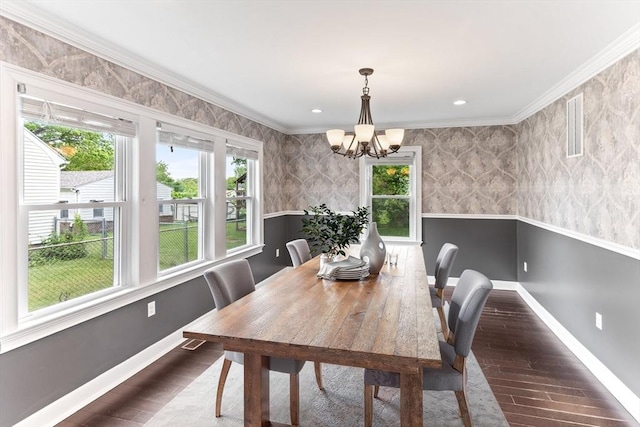 45 Curtis Ave, Attleboro, MA 02703 - dining space featuring healthy amount of natural light, a chandelier, baseboards, dark wood finished floors, and ornamental molding