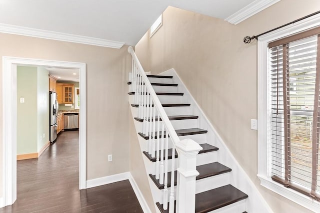 45 Curtis Ave, Attleboro, MA 02703 - stairs with ornamental molding, wood finished floors, and baseboards