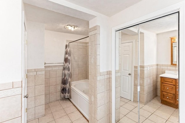 45 Curtis Ave, Attleboro, MA 02703 - full bathroom with tile walls, tile patterned flooring, a wainscoted wall, vanity, and shower / tub combo