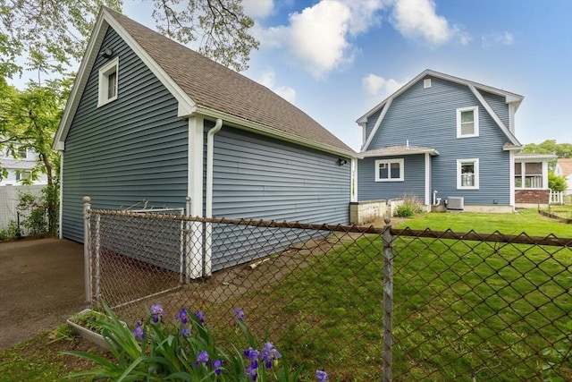 45 Curtis Ave, Attleboro, MA 02703 - rear view of house featuring central AC unit and a shingled roof