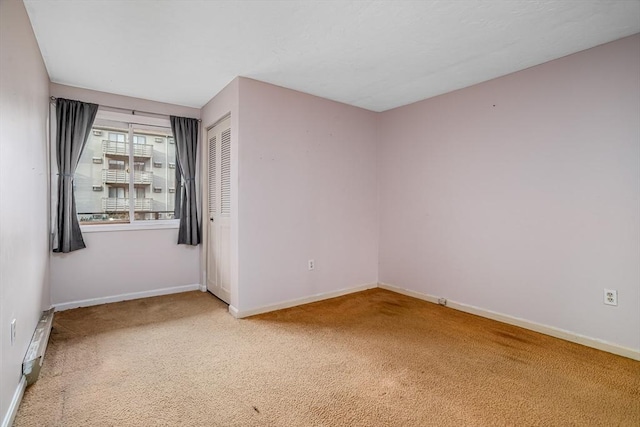 unfurnished room with carpet