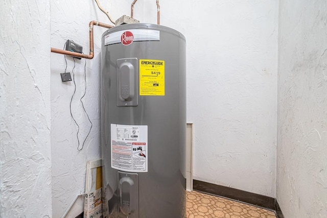 utility room featuring electric water heater