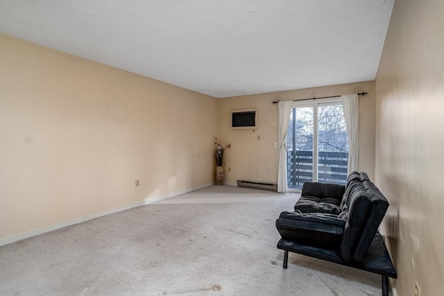 living area featuring a baseboard radiator and light carpet