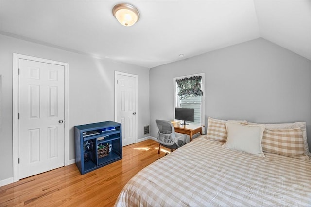 34 Prout St, Quincy, MA 02169 - bedroom featuring wood finished floors, baseboards, and lofted ceiling