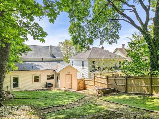 34 Prout St, Quincy, MA 02169 - back of house featuring a shingled roof