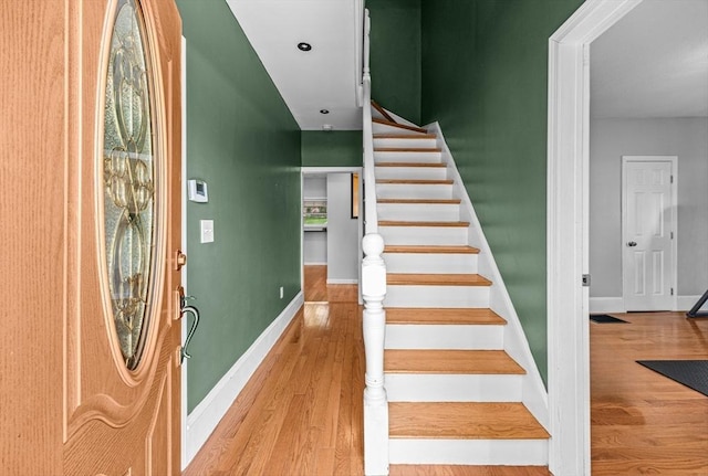 34 Prout St, Quincy, MA 02169 - entryway featuring wood finished floors, stairway, and baseboards