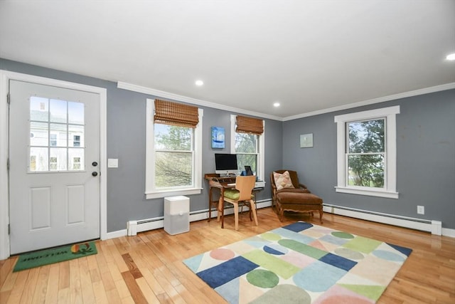 interior space with a baseboard radiator, wood finished floors, baseboards, and ornamental molding