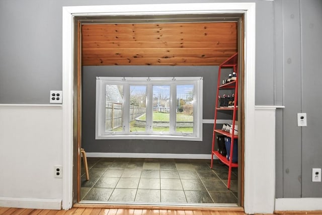 interior space featuring baseboards