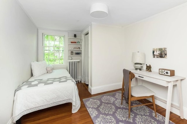 40 Stone Rd, Belmont, MA 02478 - bedroom with radiator heating unit, wood finished floors, baseboards, crown molding, and an office area