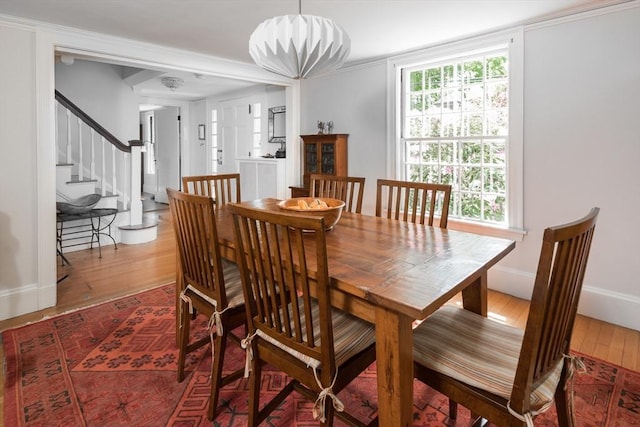 40 Stone Rd, Belmont, MA 02478 - dining space featuring wood-type flooring, stairs, and baseboards