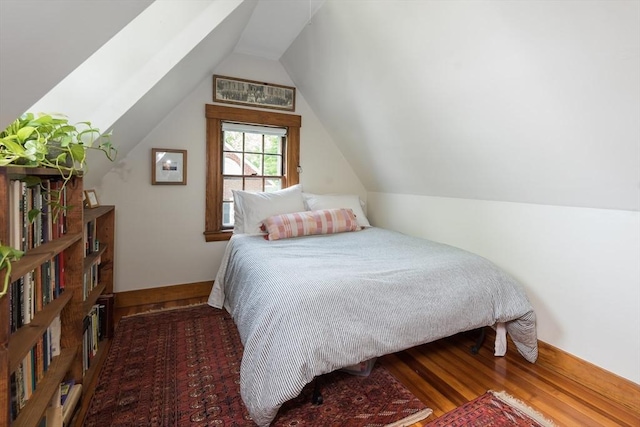 40 Stone Rd, Belmont, MA 02478 - bedroom with wood finished floors and vaulted ceiling