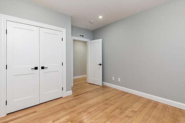 755 Boylston St Unit 2, Brookline, MA 02467 - unfurnished bedroom with baseboards, light wood-type flooring, recessed lighting, and a closet
