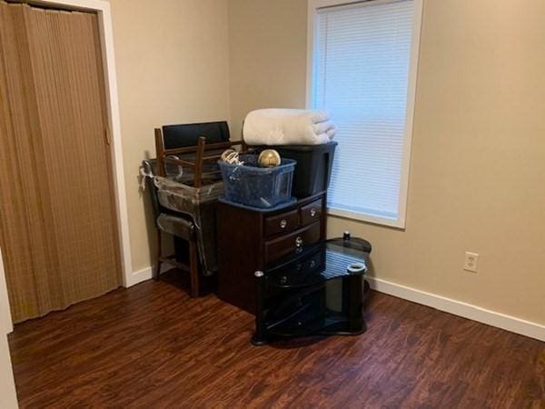 detailed view of wood finished floors and baseboards
