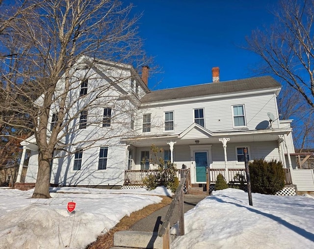 view of front of home featuring covered porch