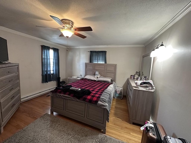 bedroom featuring a baseboard radiator, light wood-style floors, ornamental molding, ceiling fan, and a textured ceiling