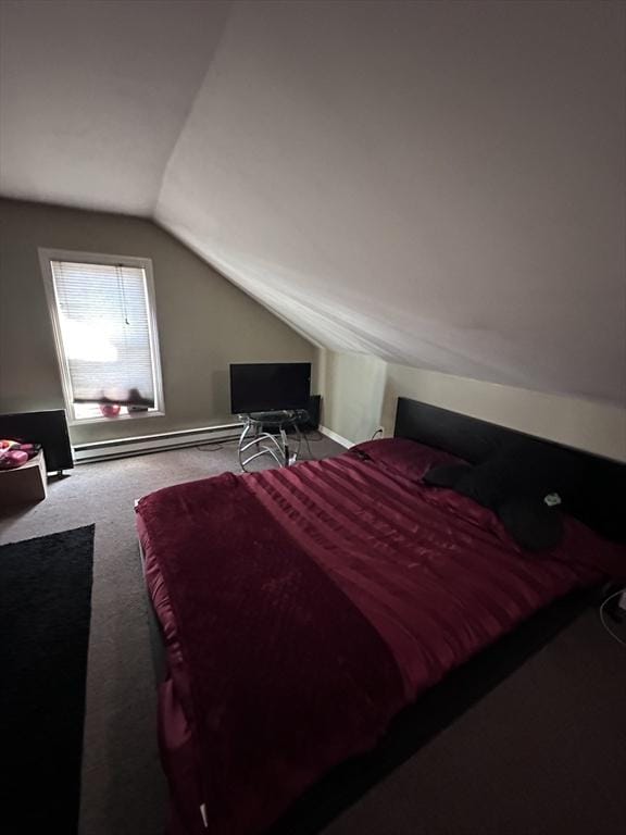 carpeted bedroom with vaulted ceiling and baseboard heating