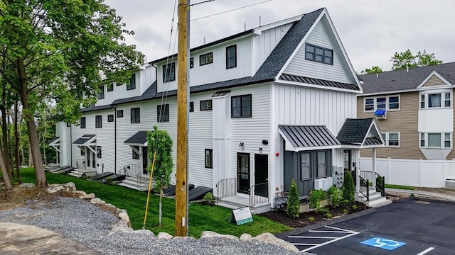 1514 Gorham St Unit 2, Lowell, MA 01852 - view of property with entry steps and uncovered parking