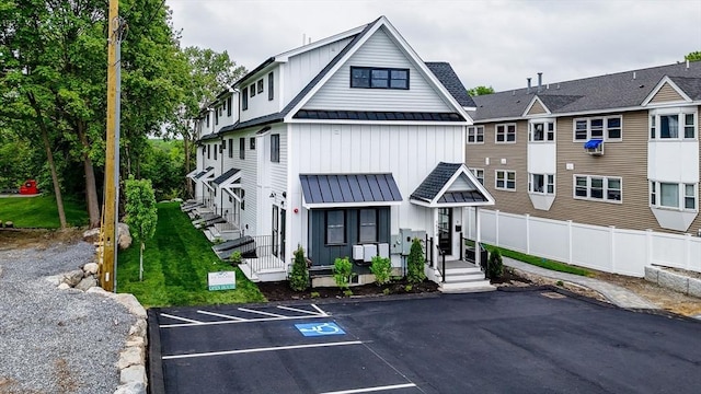 1514 Gorham St Unit 2, Lowell, MA 01852 - view of building exterior featuring uncovered parking