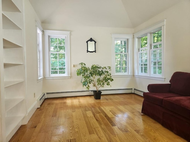 134 Mountain Rd, Princeton, MA 01541 - living area featuring healthy amount of natural light, vaulted ceiling, wood finished floors, and built in features