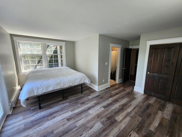 134 Mountain Rd, Princeton, MA 01541 - bedroom featuring dark wood-style flooring, baseboards, and baseboard heating
