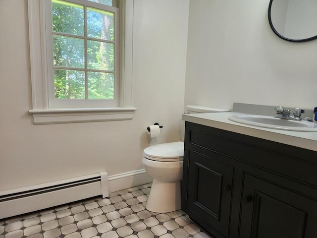 134 Mountain Rd, Princeton, MA 01541 - bathroom with a baseboard radiator, healthy amount of natural light, toilet, and vanity