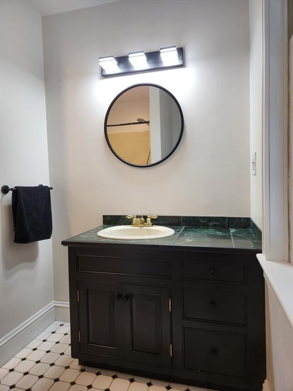 134 Mountain Rd, Princeton, MA 01541 - bathroom featuring vanity, tile patterned floors, and baseboards