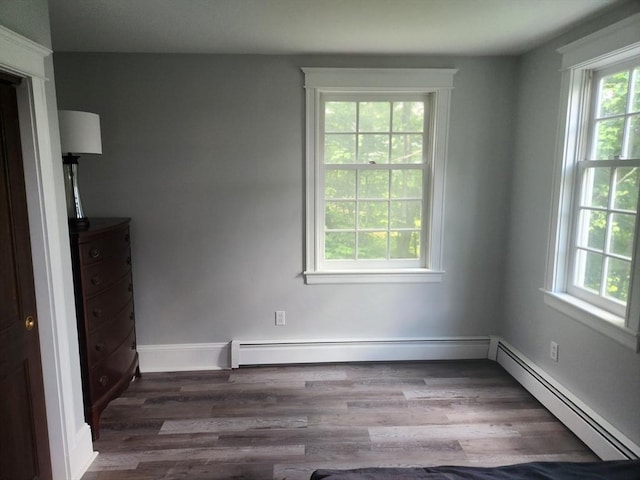 134 Mountain Rd, Princeton, MA 01541 - empty room featuring baseboard heating, plenty of natural light, and wood finished floors