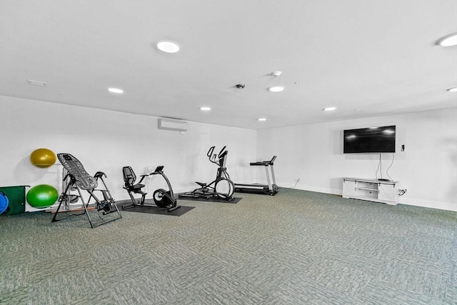 exercise room with carpet and an AC wall unit