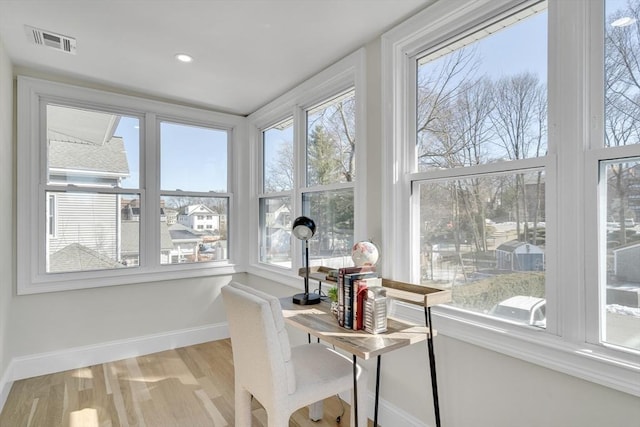 interior space with recessed lighting, visible vents, baseboards, and wood finished floors