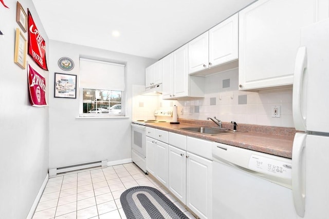 kitchen with baseboard heating, sink, white cabinets, and white appliances