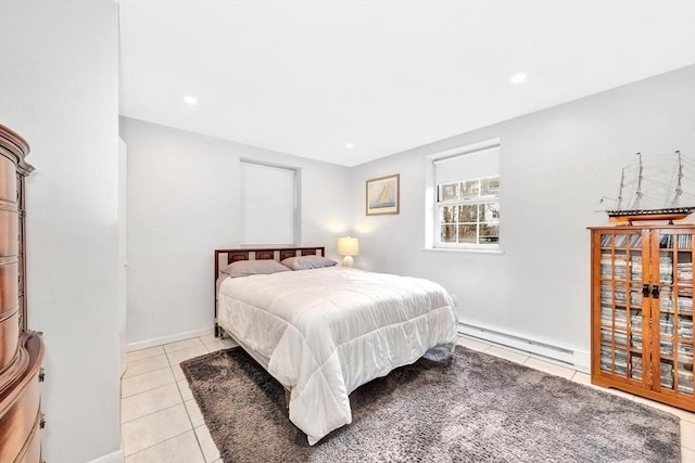 tiled bedroom featuring baseboard heating