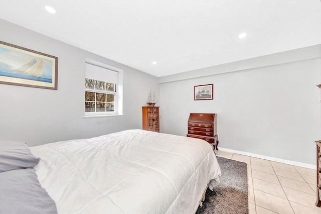 bedroom featuring light tile patterned floors