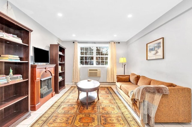 tiled living room with a wall mounted air conditioner