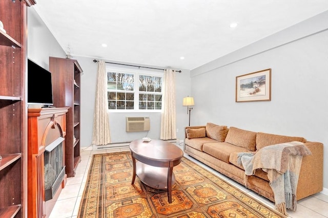 tiled living room with an AC wall unit and a tile fireplace