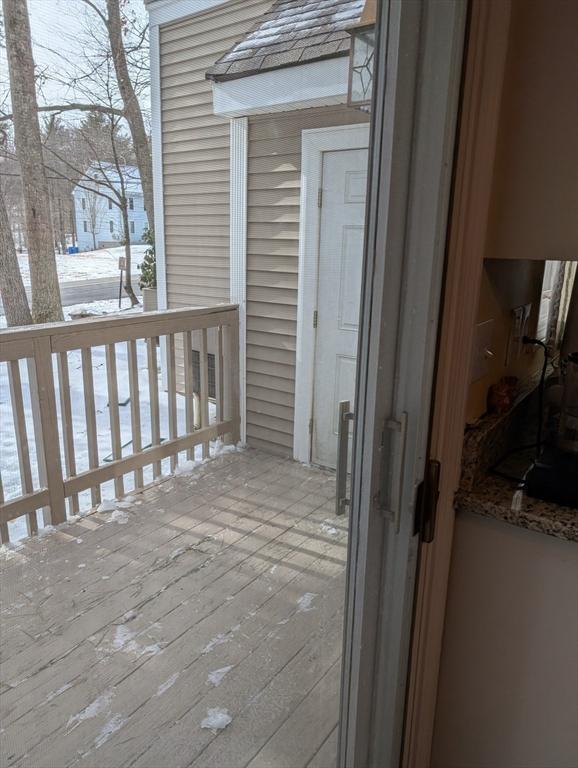 view of snow covered deck