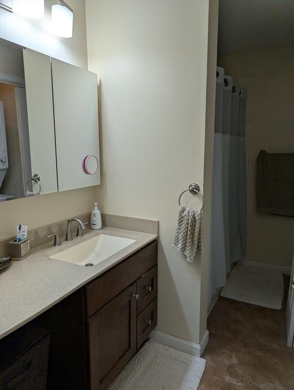 bathroom featuring vanity and walk in shower