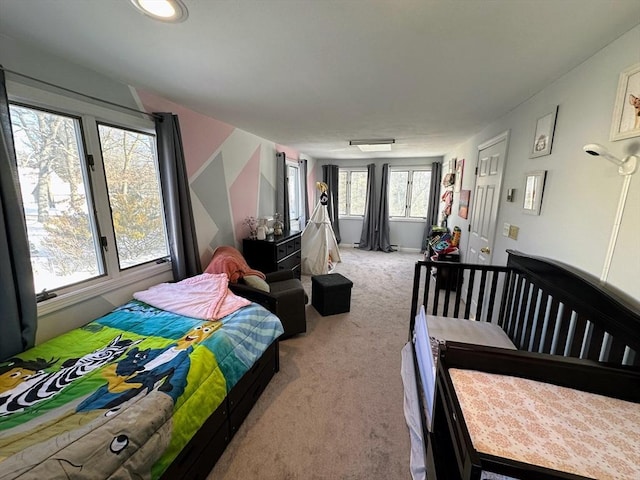 bedroom with light carpet