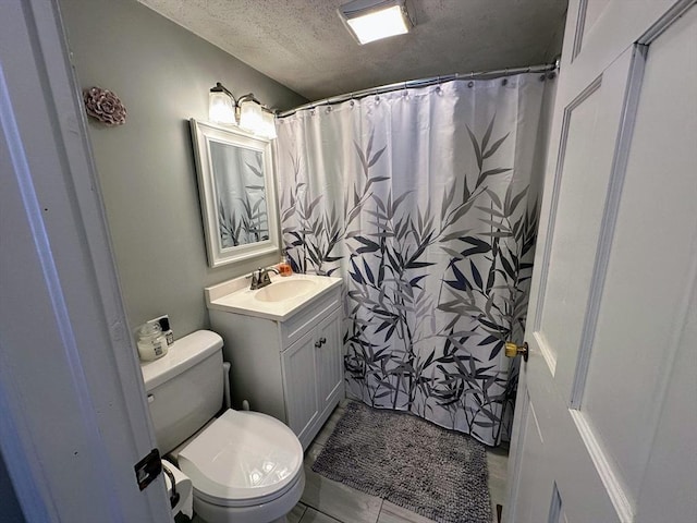 full bath featuring vanity, toilet, a textured ceiling, and a shower with shower curtain