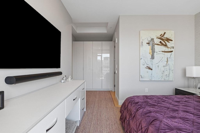 bedroom with light carpet