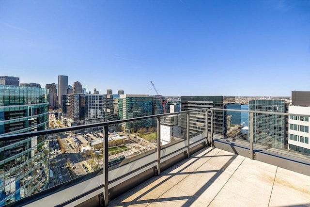 balcony featuring a view of city