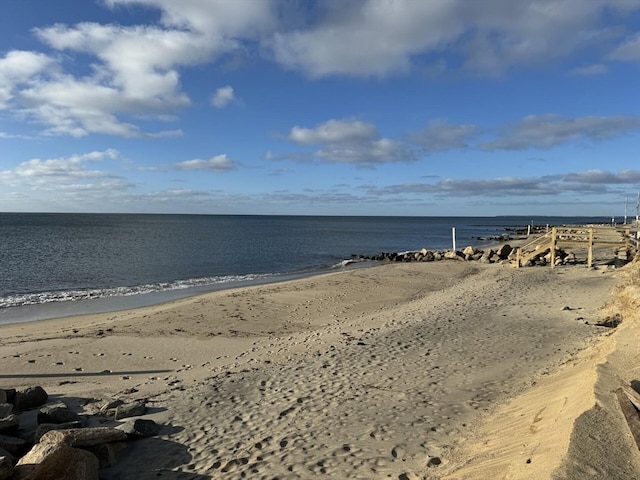 view of water feature with a beach view