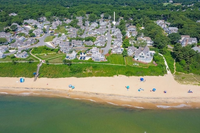 drone / aerial view with a view of the beach and a water view