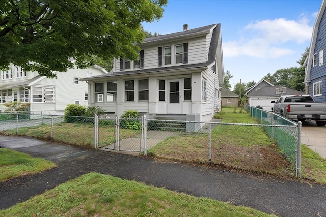 73 Biltmore St, Springfield, MA 01108 - view of front of house with a chimney, a fenced front yard, and a gate