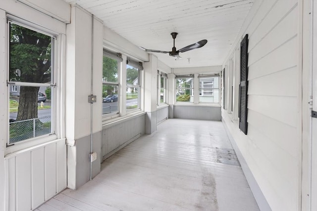 73 Biltmore St, Springfield, MA 01108 - unfurnished sunroom with a ceiling fan and wood finished floors