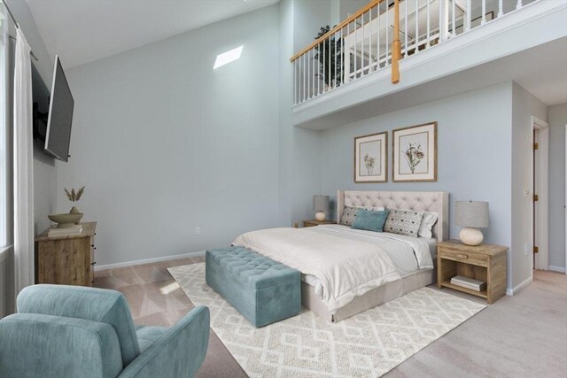 5 Brookfield Dr Unit B, Groton, MA 01450 - carpeted bedroom with a towering ceiling and baseboards