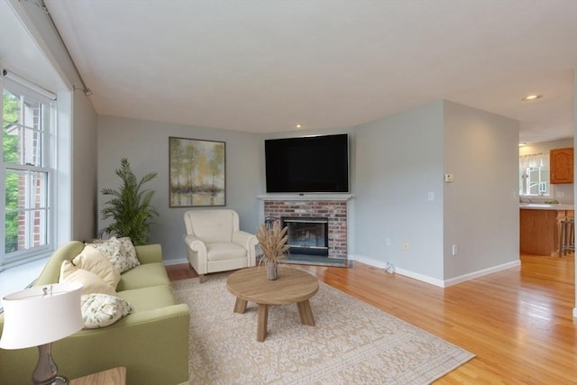 5 Brookfield Dr Unit B, Groton, MA 01450 - living room featuring a brick fireplace, light wood-style floors, and recessed lighting